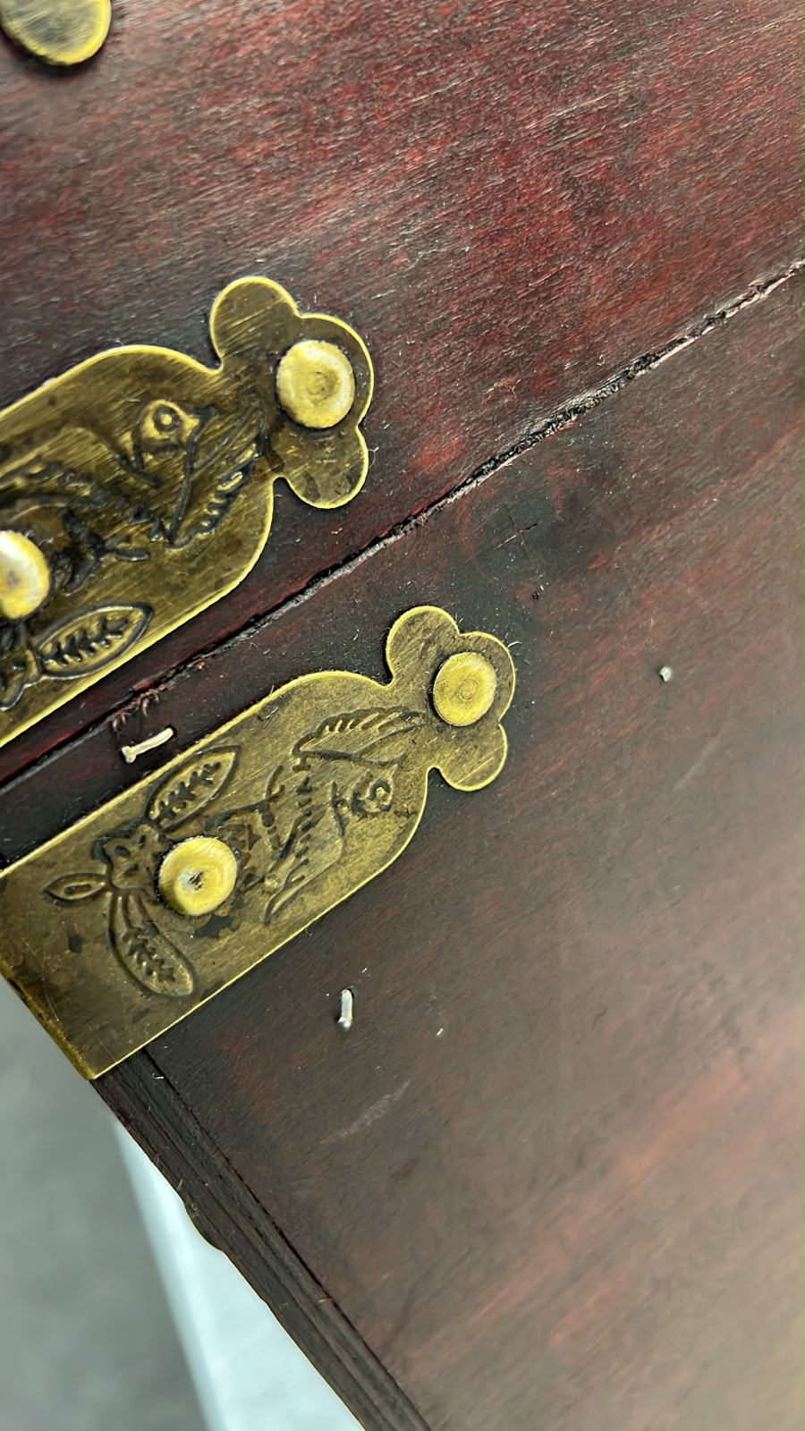 brass hinge, ornate hinge, golden latch, wooden surface, antique hardware